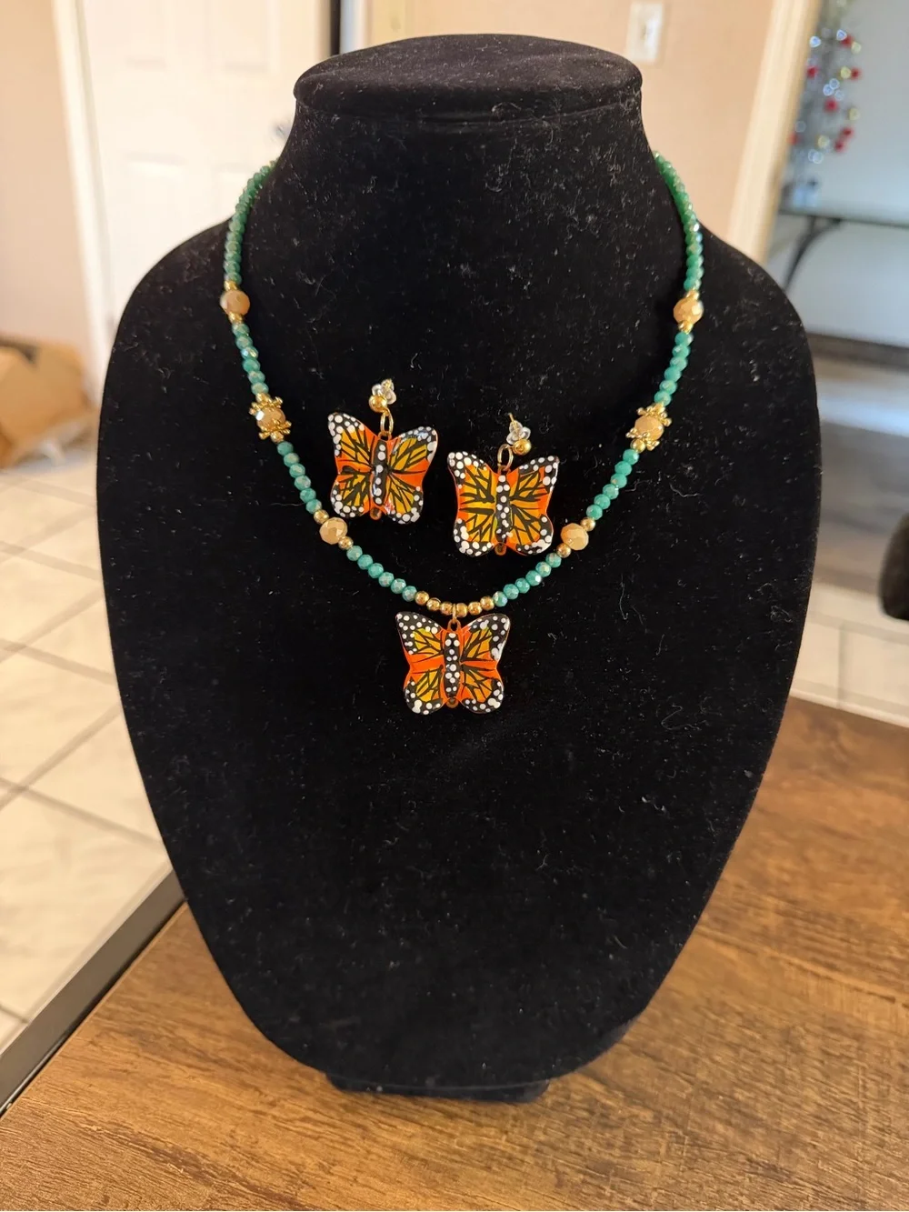 Green Beaded Necklace and Earring Set with Orange Butterfly Charms
